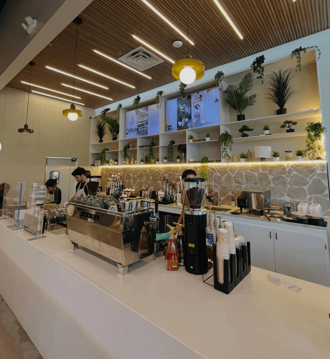 The Qurbah team at the espresso bar
