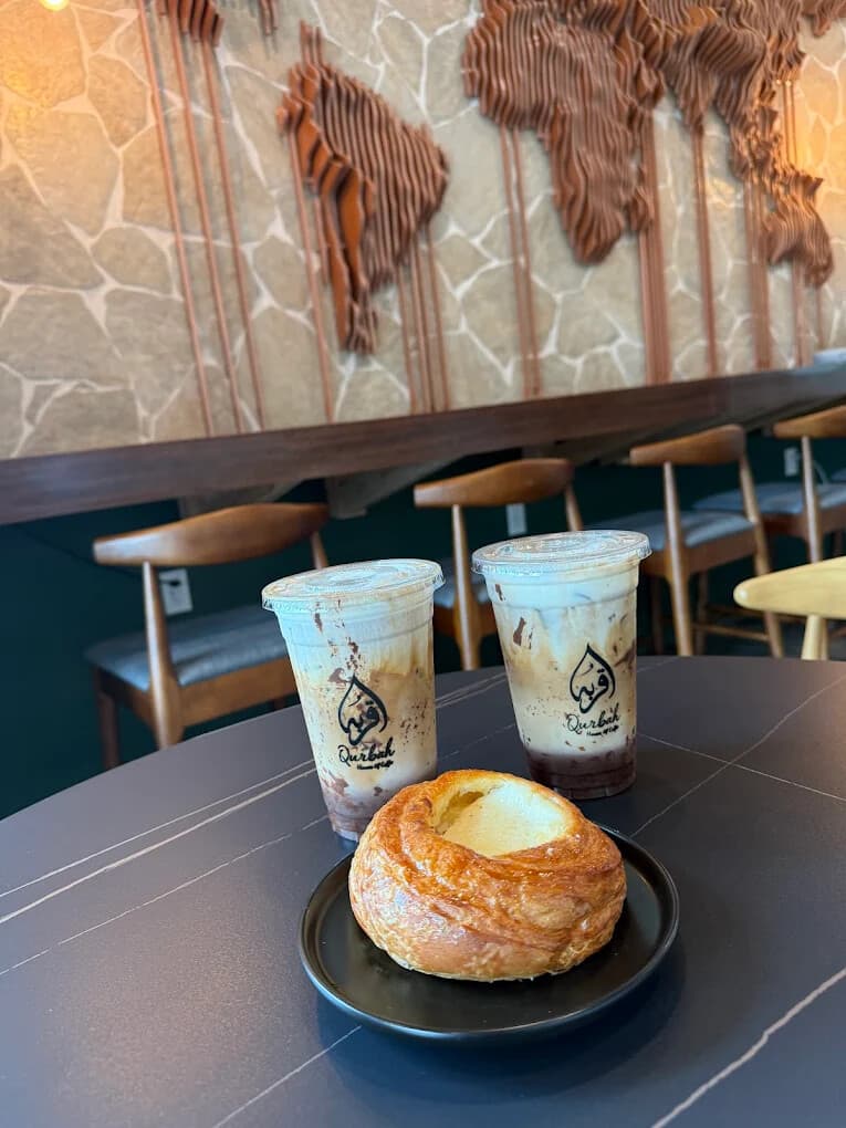 Iced drinks and a fresh pastry at Qurbah